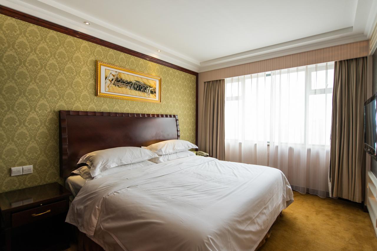Vienna International Hotel Shanghai Train Station Экстерьер фото