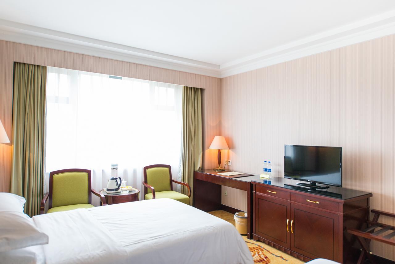 Vienna International Hotel Shanghai Train Station Экстерьер фото
